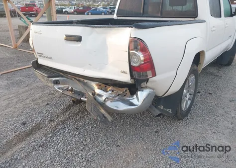 2012 Toyota Tacoma Base V6 из США, поврежденный, VIN 3TMLU4EN6CM103583